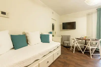 Télévision ou salle de divertissement dans l'établissement Appartement proche Champs Elysées