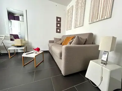 Coin salon dans l'établissement Le studio Grenelle