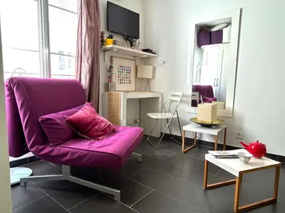 Télévision ou salle de divertissement dans l'établissement Le studio Grenelle