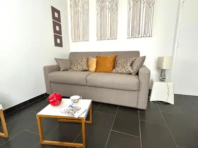 Coin salon dans l'établissement Le studio Grenelle