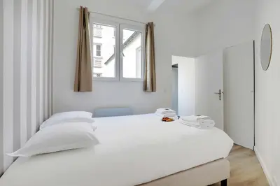 Un ou plusieurs lits dans un hébergement de l'établissement Intimate apartment - 1BR-4P - Javel