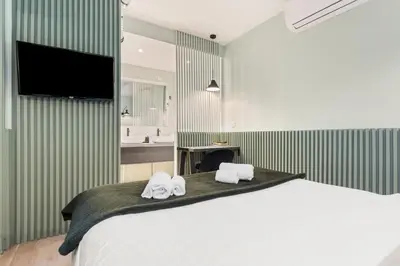 Un ou plusieurs lits dans un hébergement de l'établissement Eiffel Tower - 4 Bedrooms like a Hotel