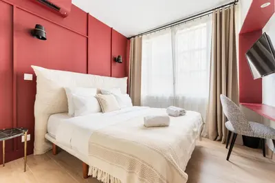 Un ou plusieurs lits dans un hébergement de l'établissement Eiffel Tower - 4 Bedrooms like a Hotel