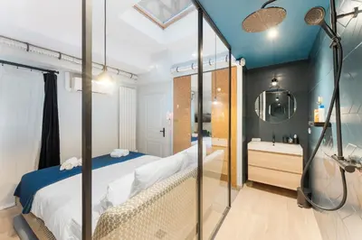 Un ou plusieurs lits dans un hébergement de l'établissement Eiffel Tower - 4 Bedrooms like a Hotel
