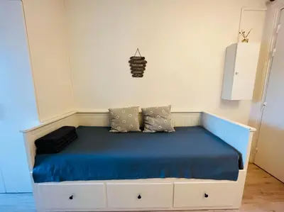 Un ou plusieurs lits dans un hébergement de l'établissement Charming Studio superb location in 7th district Paris