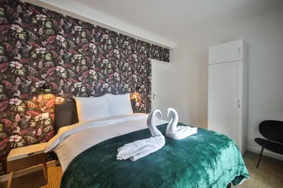 Un ou plusieurs lits dans un hébergement de l'établissement 2.Luxueux Duplex 6/8pers/Full Equipped/République