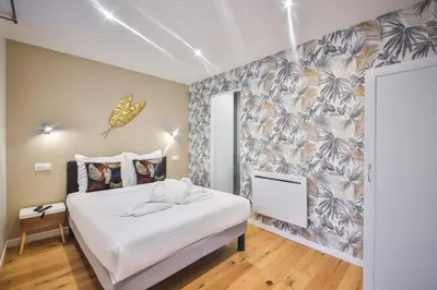 Un ou plusieurs lits dans un hébergement de l'établissement 2.Luxueux Duplex 6/8pers/Full Equipped/République