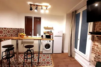 Cuisine ou kitchenette dans l'établissement Midnight in Paris Montmartre