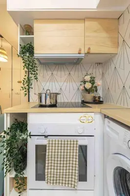 Cuisine ou kitchenette dans l'établissement Studio de charme à 2 pas de Paris