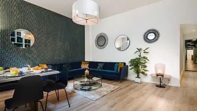 Coin salon dans l'établissement Panthéon Modern and exclusive 3BD