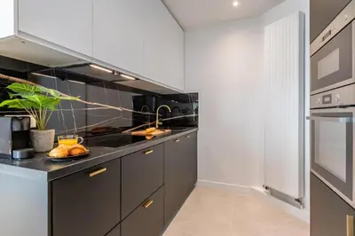 Cuisine ou kitchenette dans l'établissement Sweett - Pont Neuf