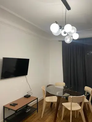 Télévision ou salle de divertissement dans l'établissement RESIDENCE NATION