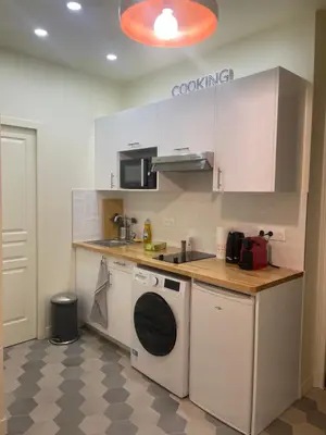 Cuisine ou kitchenette dans l'établissement RESIDENCE NATION