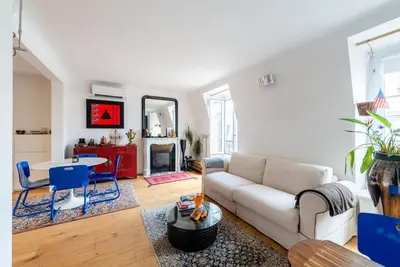 Coin salon dans l'établissement Appartement vue Tour Eiffel