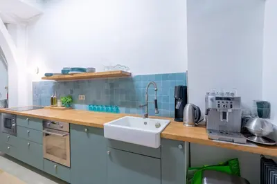 Cuisine ou kitchenette dans l'établissement Grand duplex Montmartre