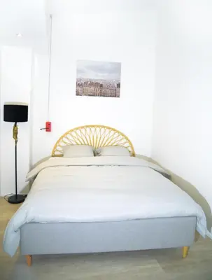 Un ou plusieurs lits dans un hébergement de l'établissement Appartment Montorgueil/Châtelet