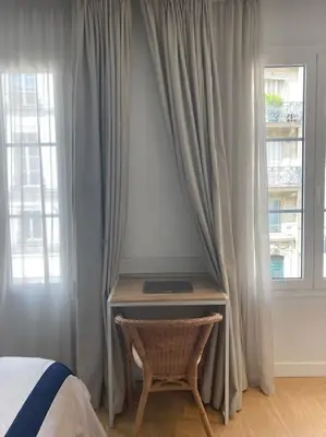Un ou plusieurs lits dans un hébergement de l'établissement Studio Saint Germain des près