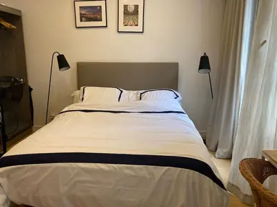 Un ou plusieurs lits dans un hébergement de l'établissement Studio Saint Germain des près