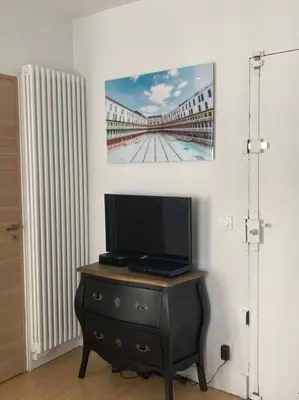 Télévision ou salle de divertissement dans l'établissement Studio Saint Germain des près