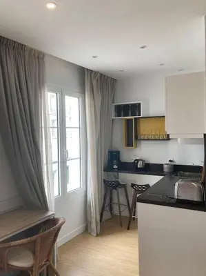 Cuisine ou kitchenette dans l'établissement Studio Saint Germain des près
