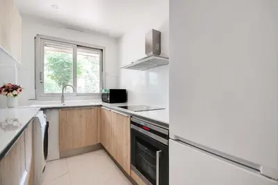 Cuisine ou kitchenette dans l'établissement Elegant apartment - 2BR-6P - Tour Eiffel