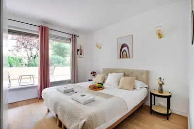 Un ou plusieurs lits dans un hébergement de l'établissement Elegant apartment - 2BR-6P - Tour Eiffel