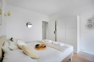 Un ou plusieurs lits dans un hébergement de l'établissement Elegant apartment - 2BR-6P - Tour Eiffel
