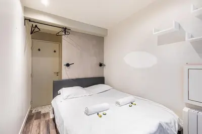 Un ou plusieurs lits dans un hébergement de l'établissement GuestReady - Appt proche du Canal Saint-Martin