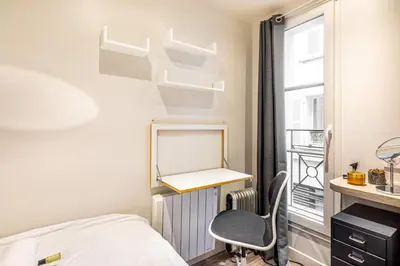 Un ou plusieurs lits dans un hébergement de l'établissement GuestReady - Appt proche du Canal Saint-Martin