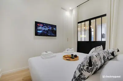 Un ou plusieurs lits dans un hébergement de l'établissement Charming apartment - 3BR-8P - Le Marais