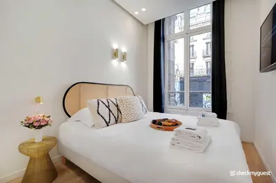 Un ou plusieurs lits dans un hébergement de l'établissement Charming apartment - 3BR-8P - Le Marais