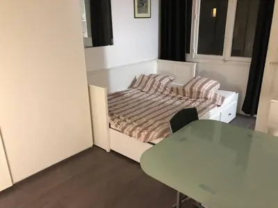 Coin salon dans l'établissement Beau appartement,proche de métro