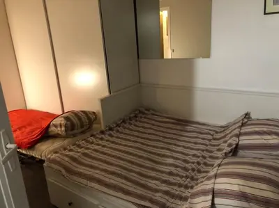 Un ou plusieurs lits dans un hébergement de l'établissement Beau appartement,proche de métro