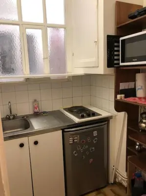 Cuisine ou kitchenette dans l'établissement Beau appartement,proche de métro