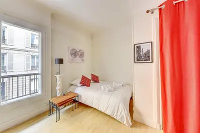 Un ou plusieurs lits dans un hébergement de l'établissement Appartement Groult - Welkeys