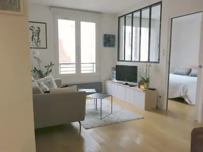 Télévision ou salle de divertissement dans l'établissement Charme moderne Lantiez CityCosy