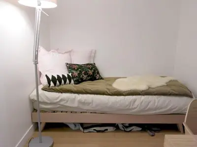 Un ou plusieurs lits dans un hébergement de l'établissement Charme moderne Lantiez CityCosy