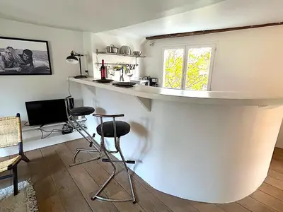 Télévision ou salle de divertissement dans l'établissement Le Penthouse Picardie