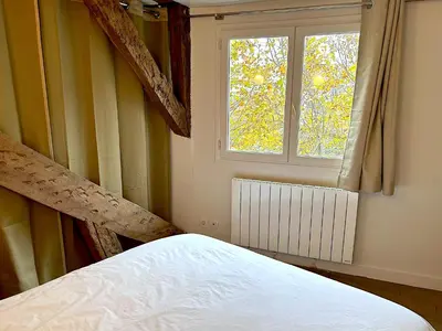 Un ou plusieurs lits dans un hébergement de l'établissement Le Penthouse Picardie