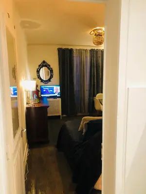 Télévision ou salle de divertissement dans l'établissement Habitation CASSIOPEE