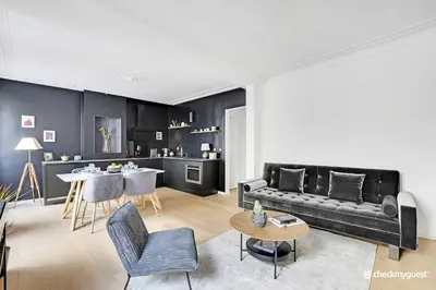 Coin salon dans l'établissement Elegant apartment - 1BR-4P - Les Batignolles