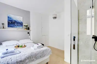 Un ou plusieurs lits dans un hébergement de l'établissement Elegant apartment - 1BR-4P - Les Batignolles