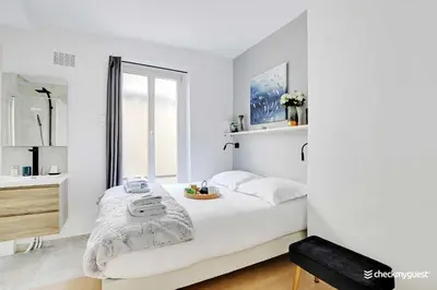 Un ou plusieurs lits dans un hébergement de l'établissement Elegant apartment - 1BR-4P - Les Batignolles