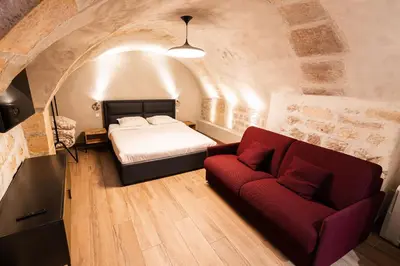 Un ou plusieurs lits dans un hébergement de l'établissement Loft 1 BR Marais, Notre Dame AC by LCC Agency