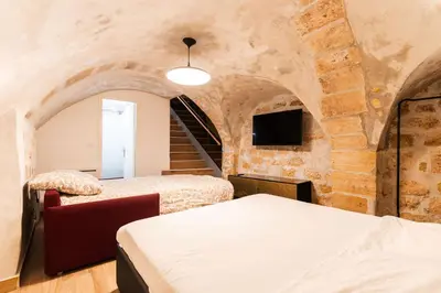 Un ou plusieurs lits dans un hébergement de l'établissement Loft 1 BR Marais, Notre Dame AC by LCC Agency