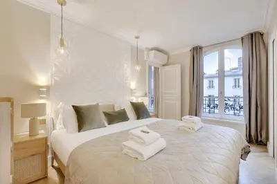 Un ou plusieurs lits dans un hébergement de l'établissement Charming apartment - 1BR-4P - Montmartre