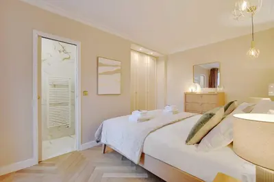 Un ou plusieurs lits dans un hébergement de l'établissement Charming apartment - 1BR-4P - Montmartre