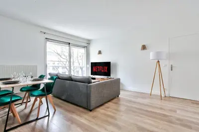 Coin salon dans l'établissement Appartement Quartier Panthéon Free Netflix