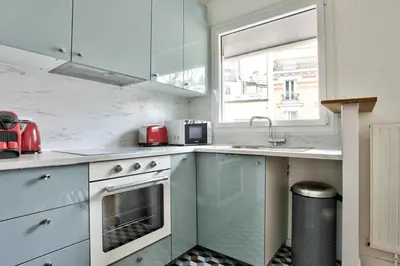 Cuisine ou kitchenette dans l'établissement Appartement Quartier Panthéon Free Netflix