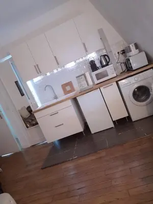 Cuisine ou kitchenette dans l'établissement Studio Neuilly Paris La Défense